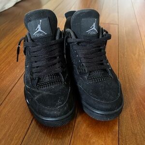 Black Cat Jordan 4’s.